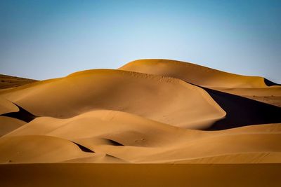 Low angle view of sand dunes in desert