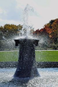 Fountain in park in summer