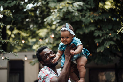 Father and son on baby