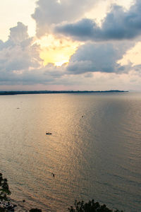 Scenic view of sea against sky at sunset