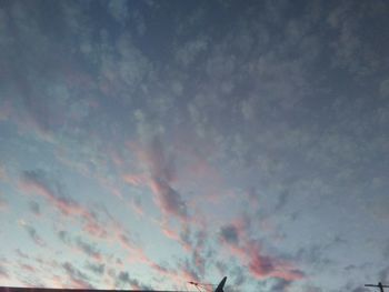 Low angle view of dramatic sky during sunset