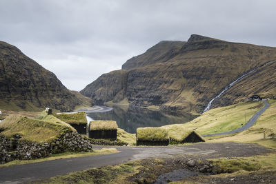 Scenic view of landscape and mountains against sky