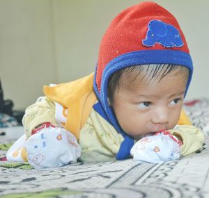 Portrait of cute boy looking away