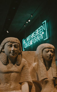 Low angle view of illuminated statue