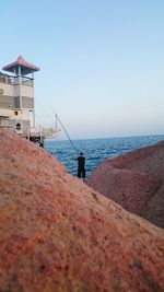 Scenic view of sea against clear sky