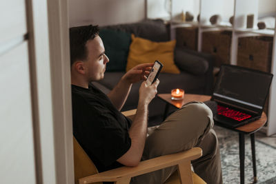 Young woman using mobile phone