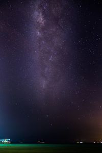 Scenic view of star field against sky at night