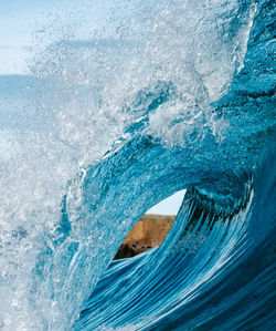 Close-up of waves splashing in sea