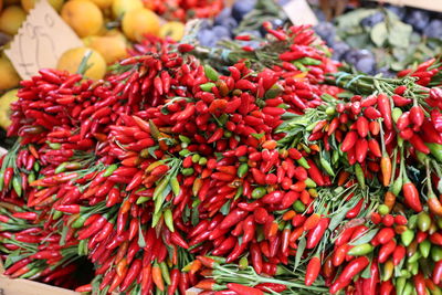 Red chili peppers for sale at market stall