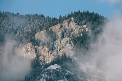 Scenic view of snow covered mountain against sky