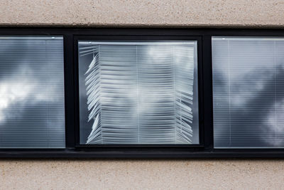 Close-up of closed window of building