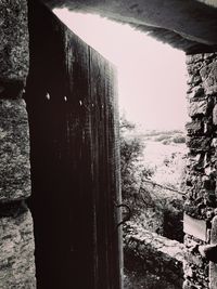 Close-up of old building against sky