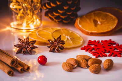 Close-up of food with illuminated string lights on table