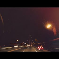 Cars moving on road at night