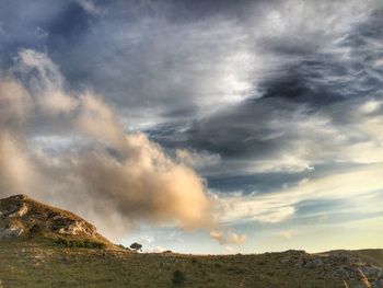 Panoramic view of landscape against sky during sunset