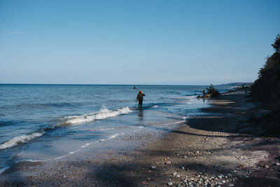 Scenic view of sea against clear sky