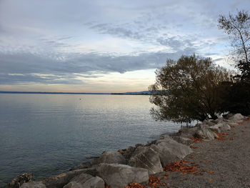 Scenic view of sea against sky during sunset