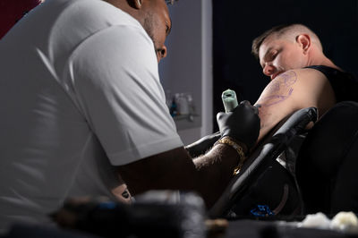 High angle view of man holding hands