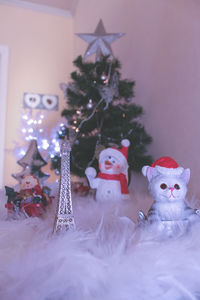 Close-up of illuminated christmas tree at home