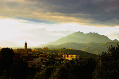 View of a esparreguera town at sunset, with montserrat in the background.