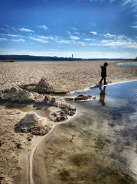 Scenic view of beach against sky