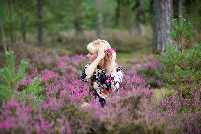 Beautiful woman looking away at lavender field