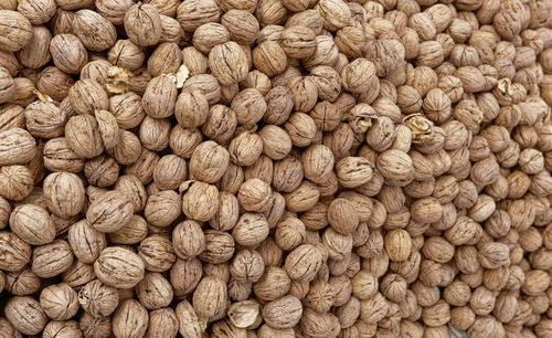 Full frame shot of walnuts for sale at market