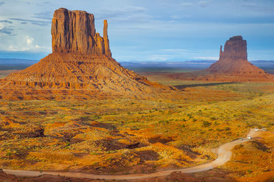 Scenic view of classical rock formation  of monument valley against sky