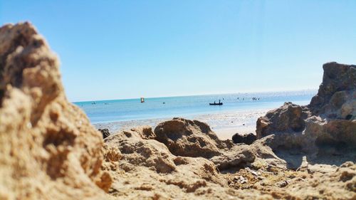 Scenic view of sea against clear blue sky