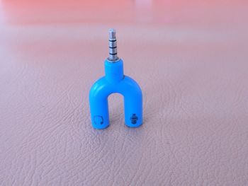 Close-up of toy on blue table