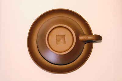 Close-up of coffee cup against white background