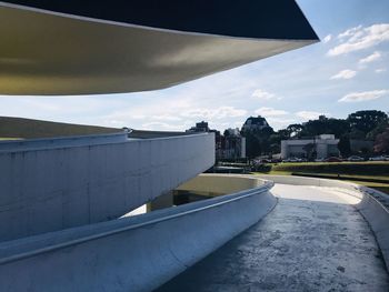 Road passing through city buildings