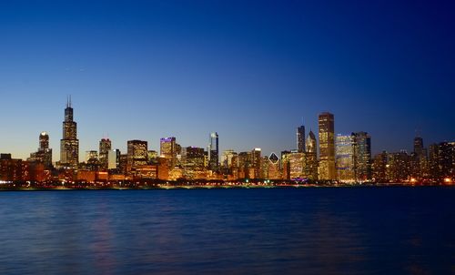 Illuminated cityscape at night