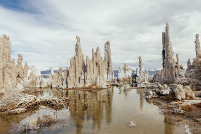 Panoramic view of rock formations against sky