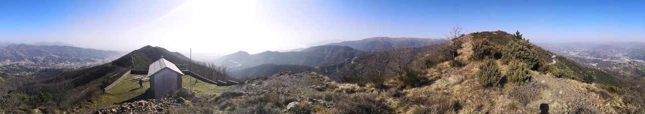 Panoramic view of mountains against clear sky