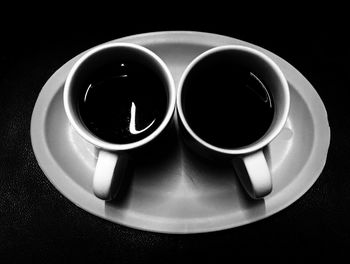 Close-up of coffee cup on table