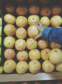 Full frame shot of oranges for sale at market stall