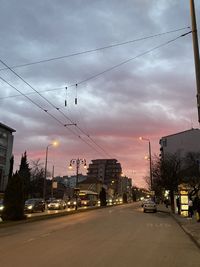 Street against sky at dusk