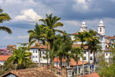 Historic center of the city of diamantina with its colonial-style houses, church and palm trees