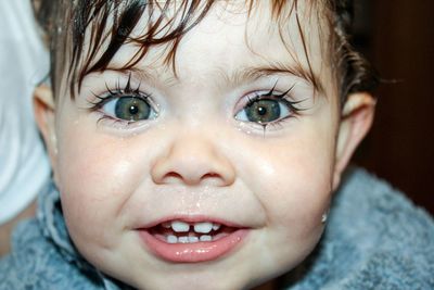 Close-up portrait of cute baby at home