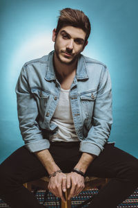 Portrait of man standing outdoors