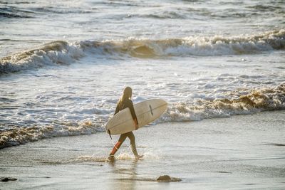 Waves splashing on shore