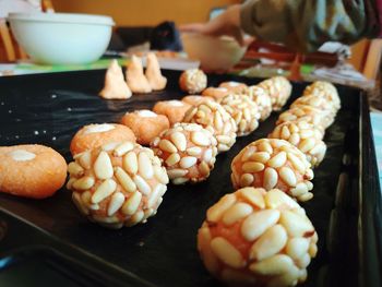 High angle view of cookies in container on table