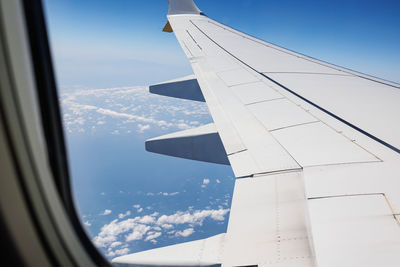 Cropped image of airplane wing