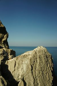 Scenic view of sea against blue sky