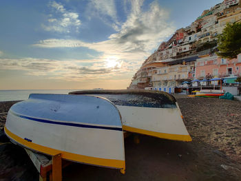 Scenic view of beach against sky during sunset