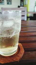 Close-up of beer glass on table