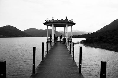Pier on sea against sky