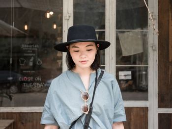 Young woman wearing hat