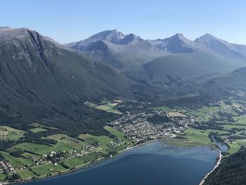 Scenic view of landscape and mountains against sky